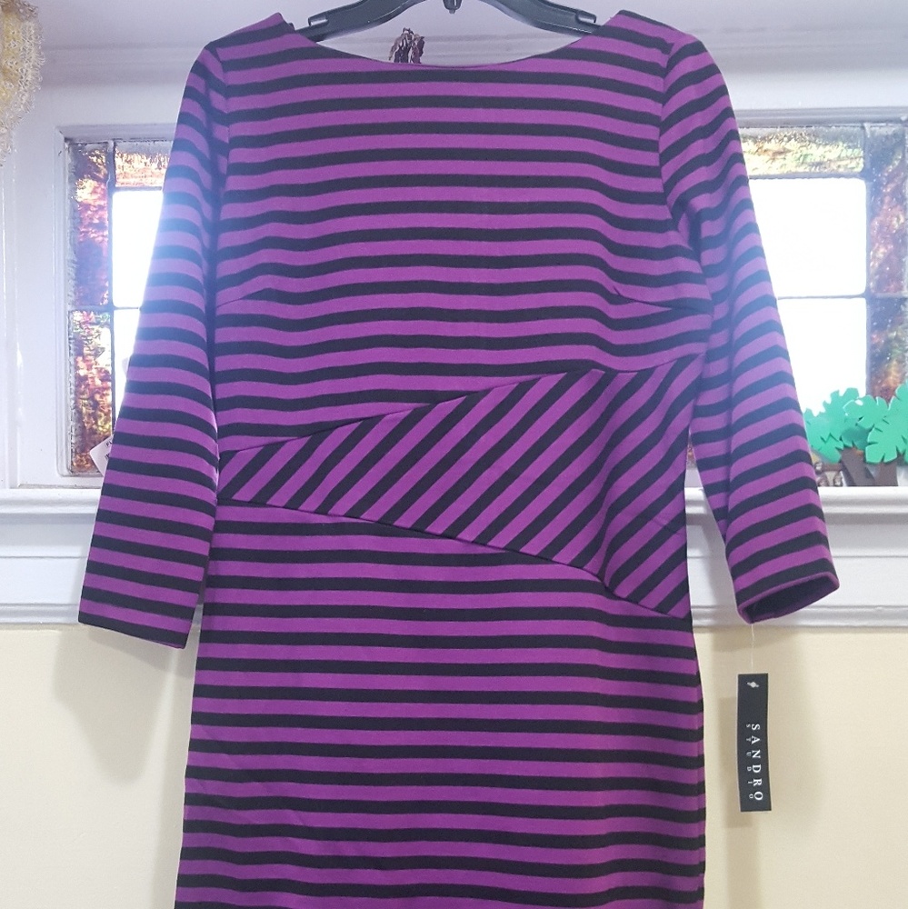 Purple and black stripe office wear .